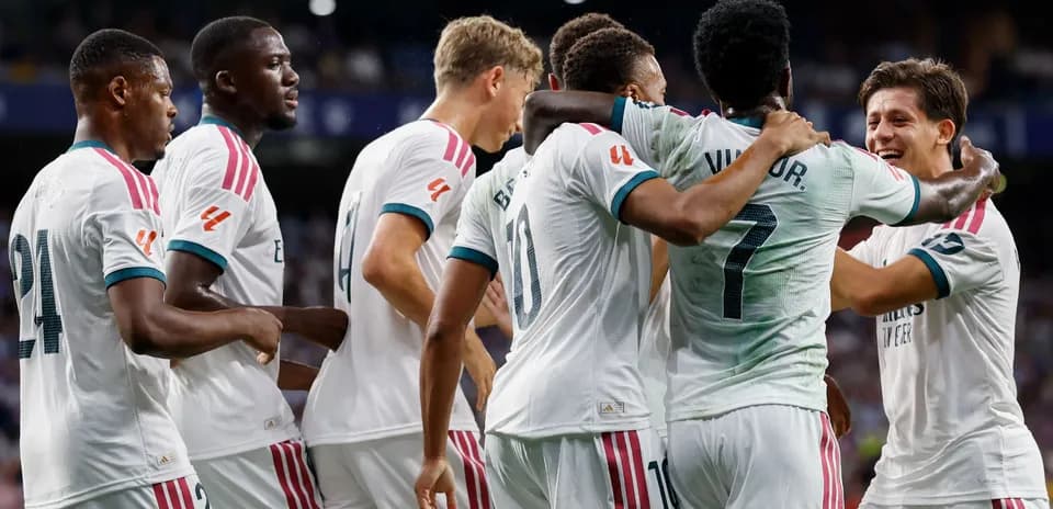 Real Madrid players celebrating a goal during match