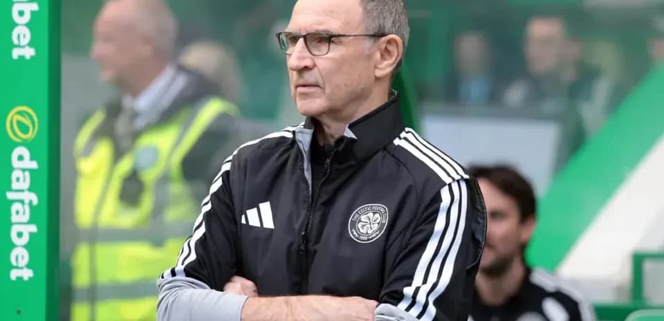 Manager observing from the sidelines during match