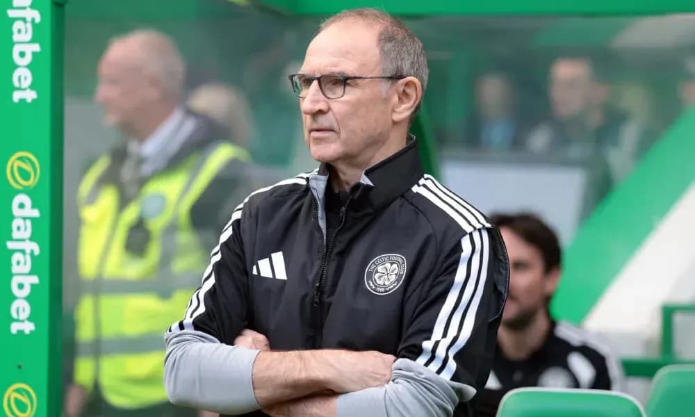 Manager observing from the sidelines during match