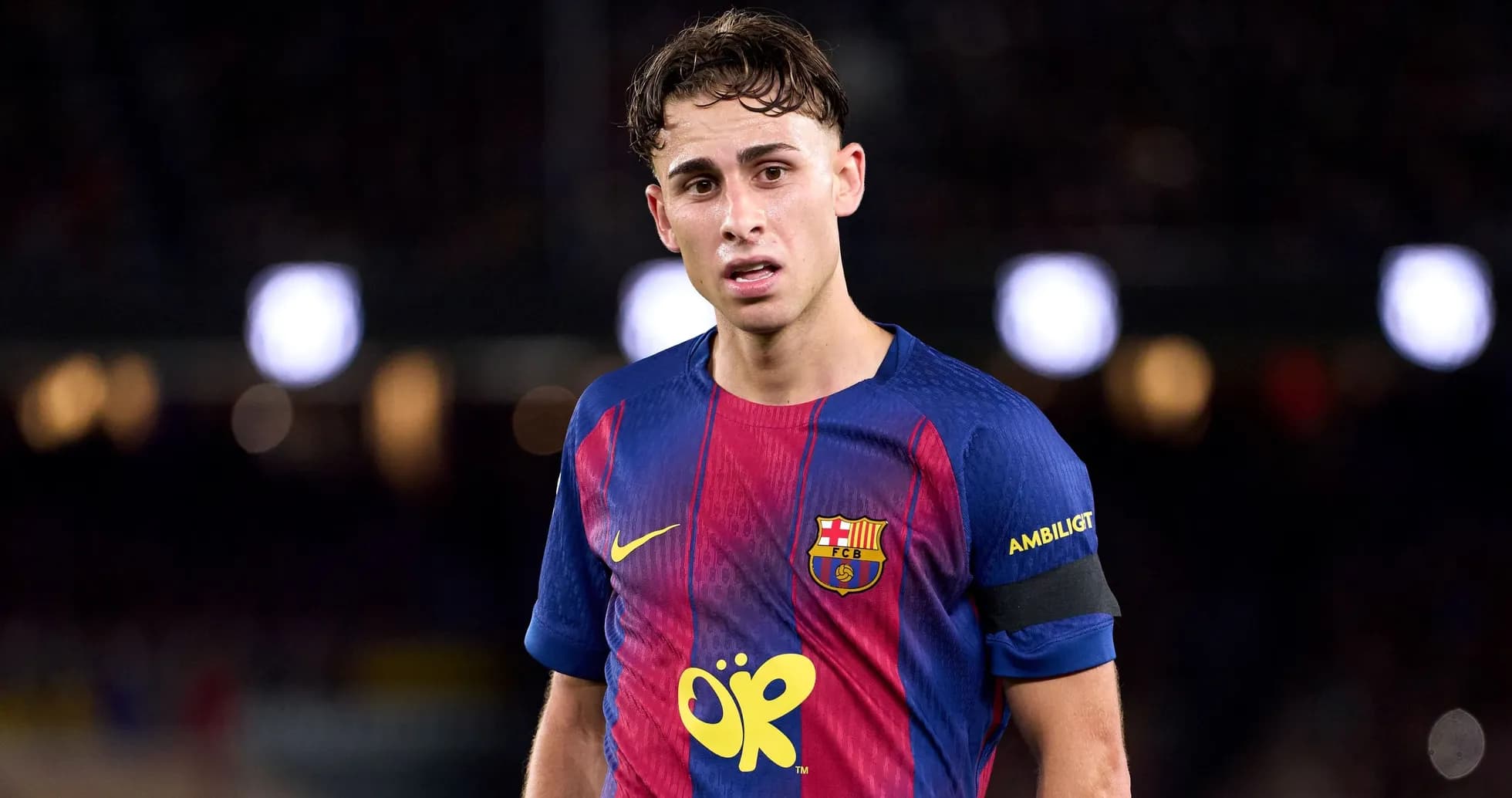 Player wearing FC Barcelona jersey on the field