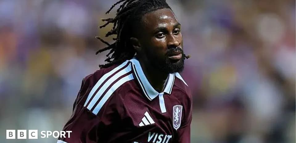 Player in maroon jersey during a match