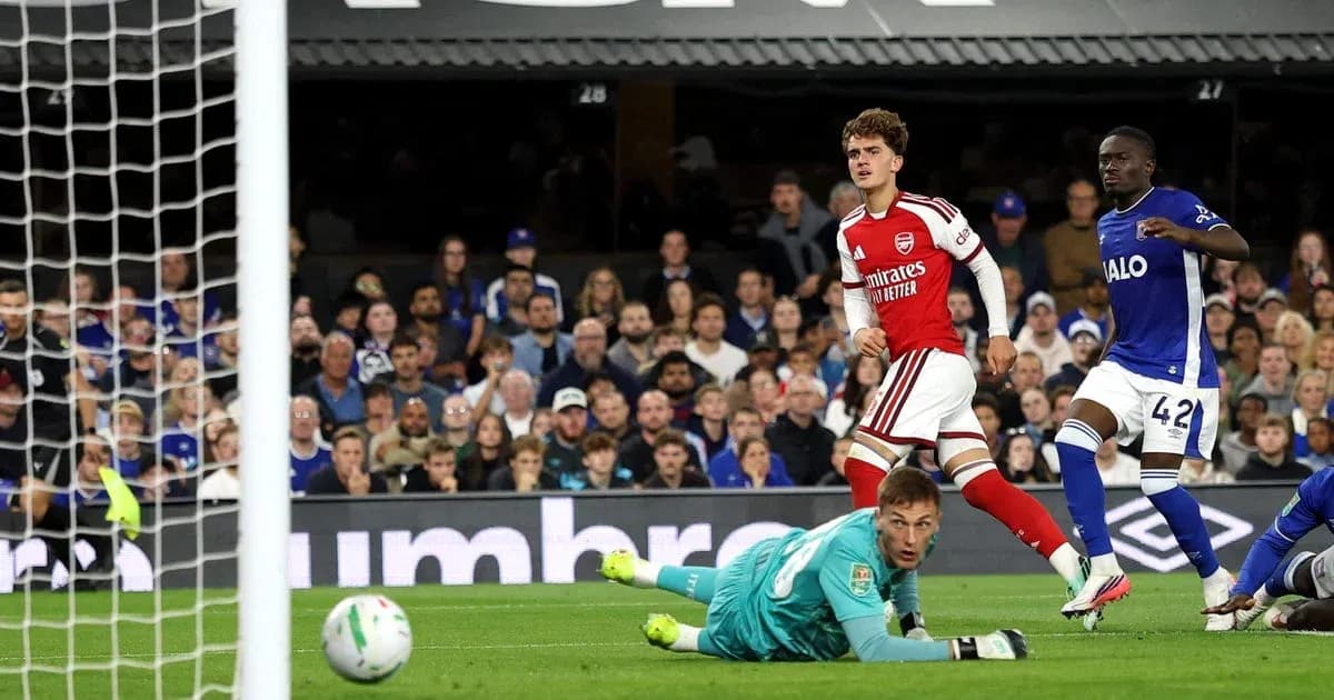 Arsenal player celebrates after scoring against Everton