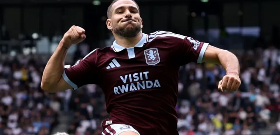 Player celebrating a goal in Aston Villa kit