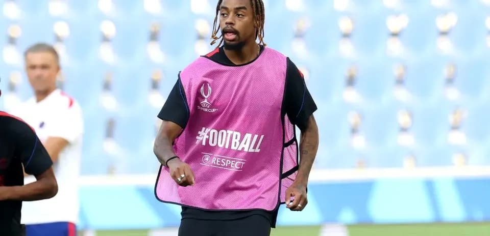 Player warming up in training session with teammates