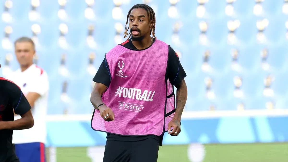 Player warming up in training session with teammates