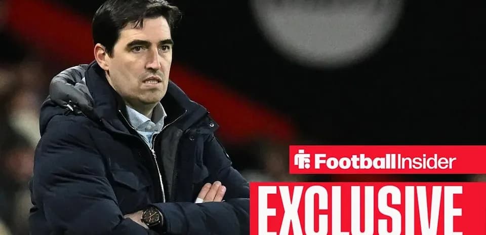 Football manager observing the game from sidelines