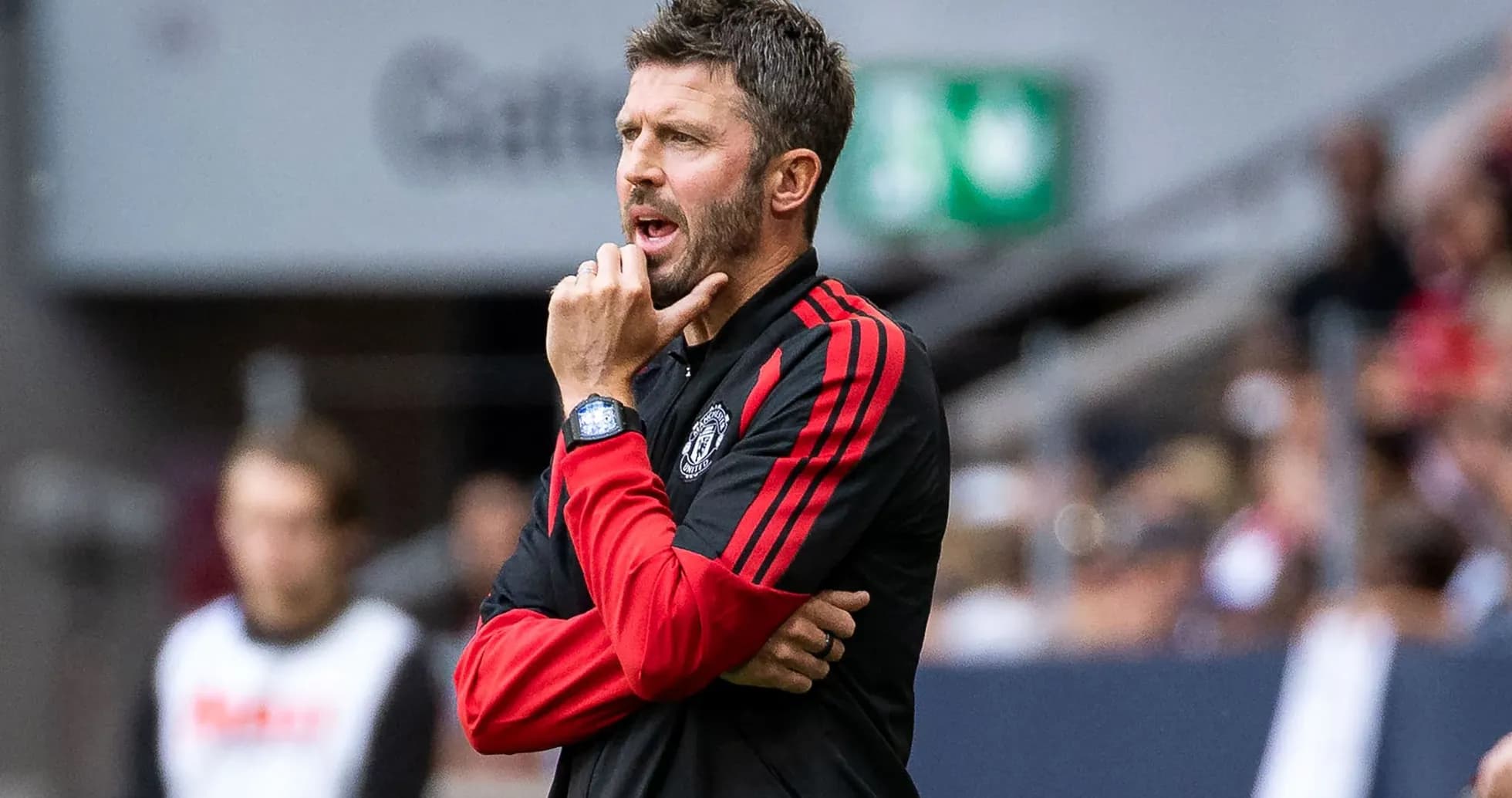 Coach giving instructions during a match