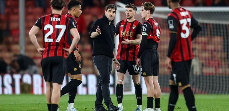 Manager discussing strategy with Bournemouth players