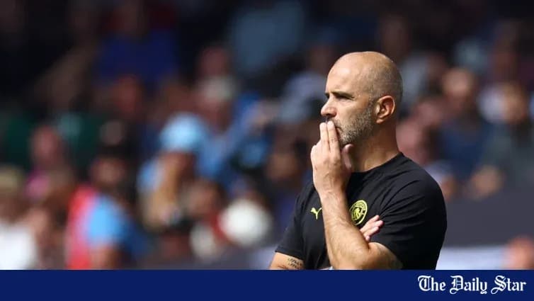 Coach observing the match with a thoughtful expression