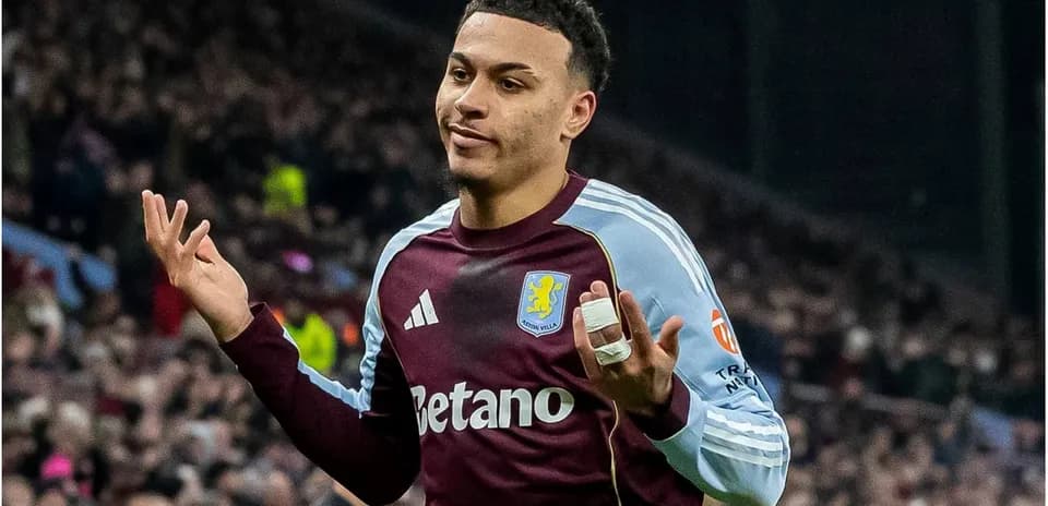 Player gesturing during a match at Villa Park