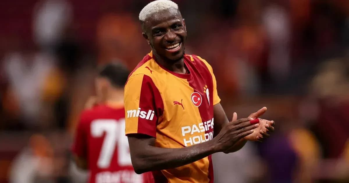 Player celebrating in Galatasaray jersey after match