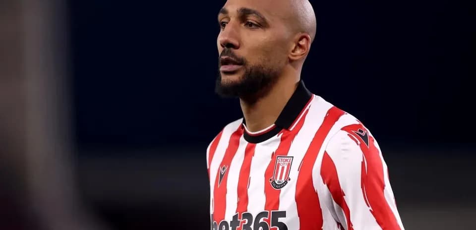 Player wearing Stoke City kit during match