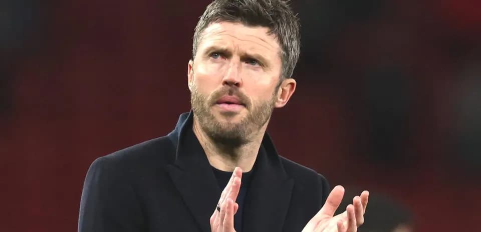 Manager applauding during match at stadium