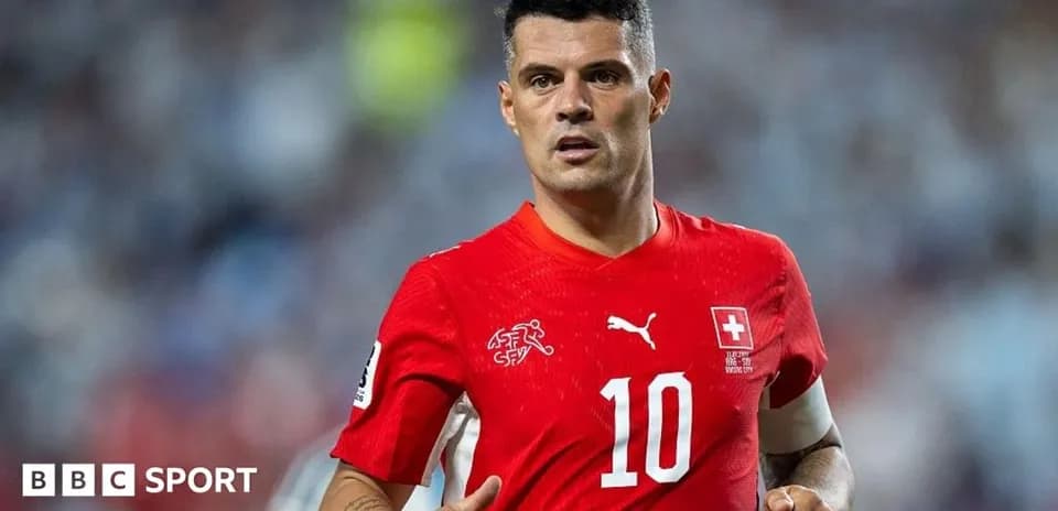 Player wearing red Switzerland jersey during match