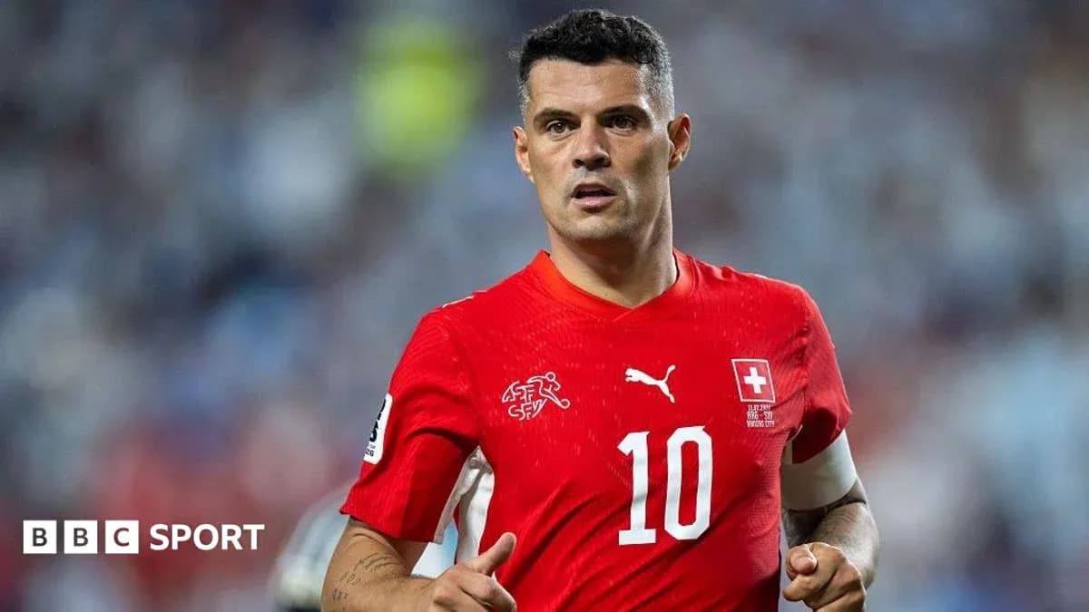 Player wearing red Switzerland jersey during match