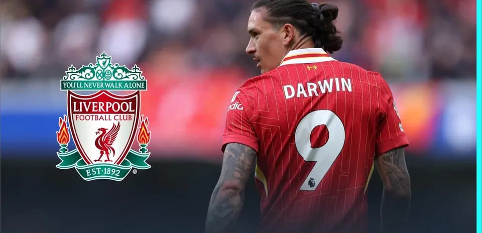 Player wearing Liverpool jersey with number 9