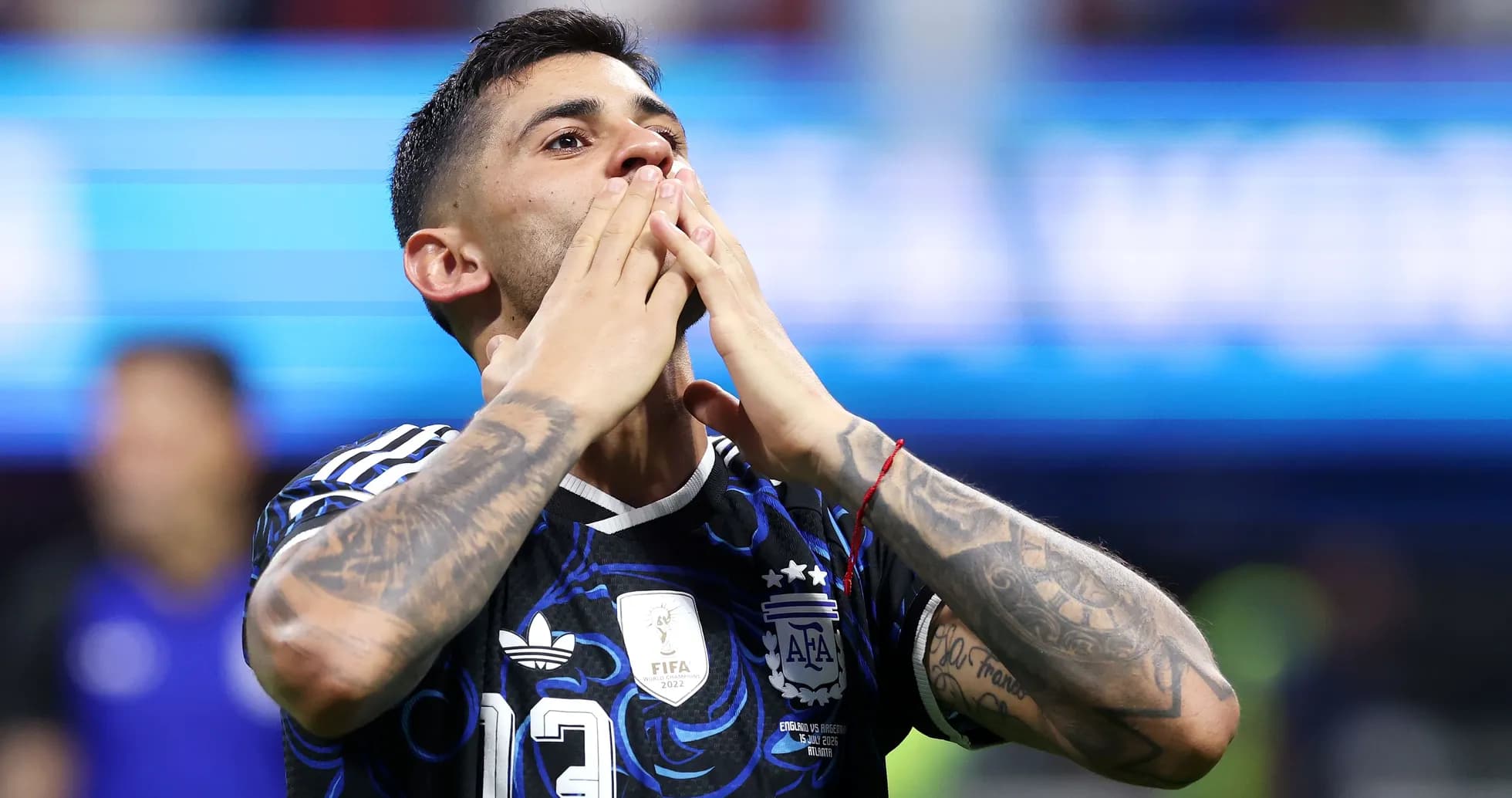 Player celebrating with hands to face after match