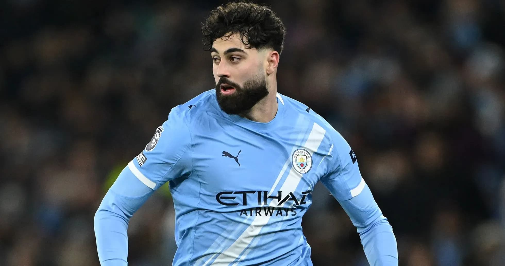 Player in blue Manchester City kit during match
