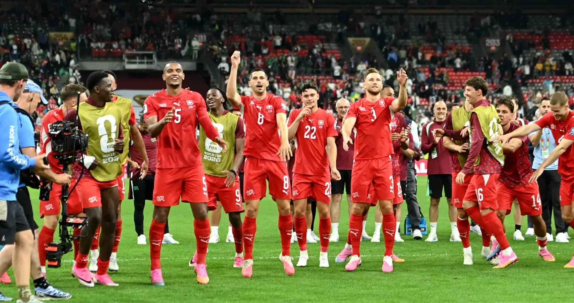 Switzerland players celebrating after match victory