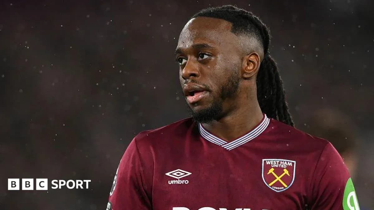 West Ham United player during match in rain