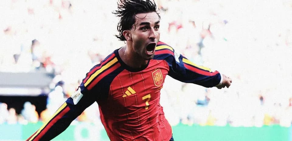 Player celebrating after scoring a goal for Spain