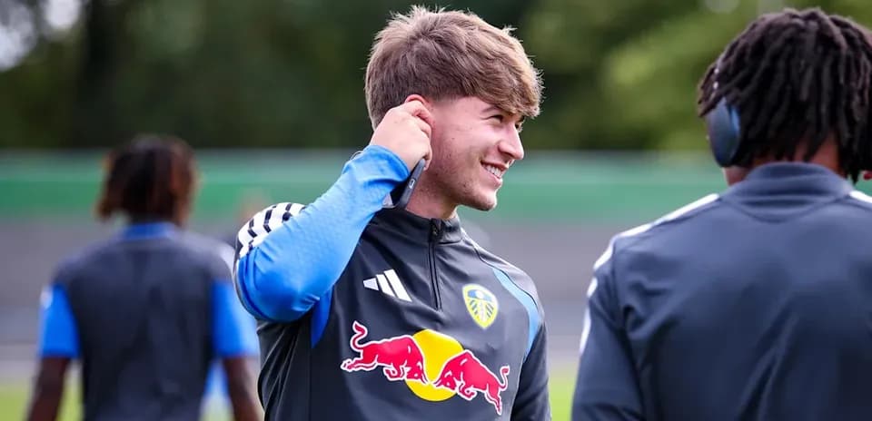 Player adjusting earpiece during training session