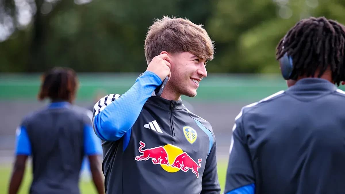 Player adjusting earpiece during training session