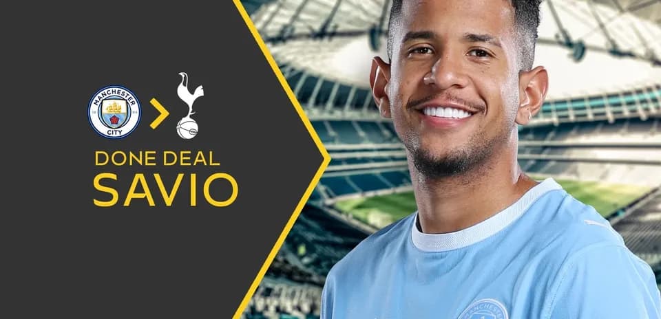 Savio smiling in Manchester City jersey announcement