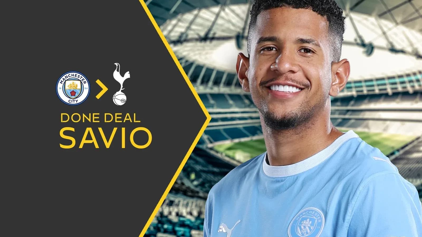 Savio smiling in Manchester City jersey announcement