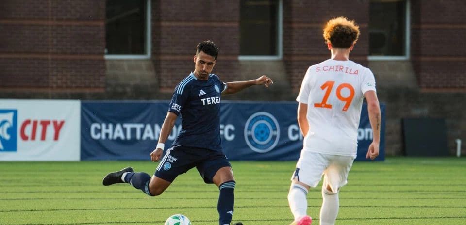 Player kicking ball during FC Cincinnati II match