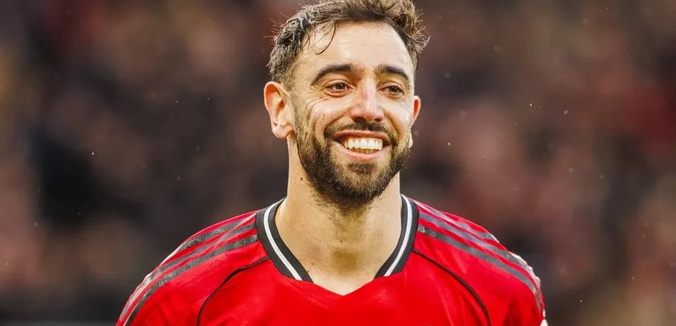 Bruno Fernandes smiling in Manchester United jersey
