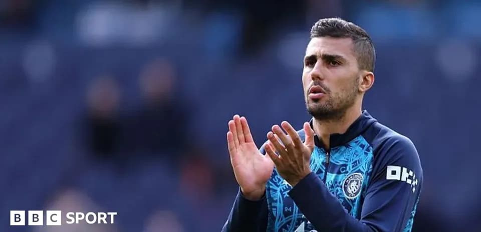 Player applauding fans during match warm-up