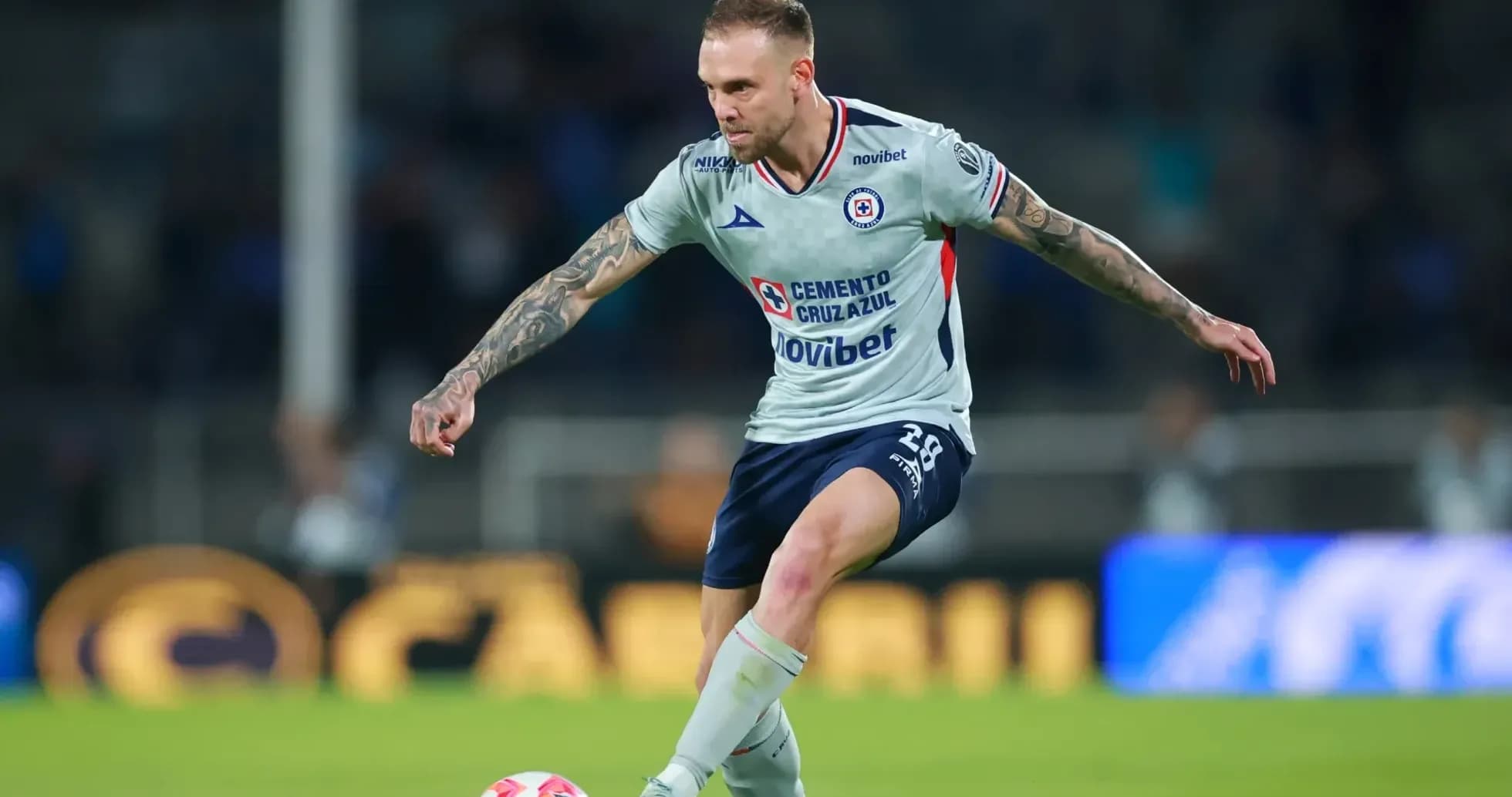 Cruz Azul player in action during match