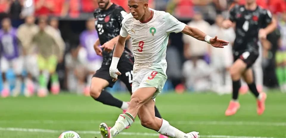 Morocco player shooting during World Cup match