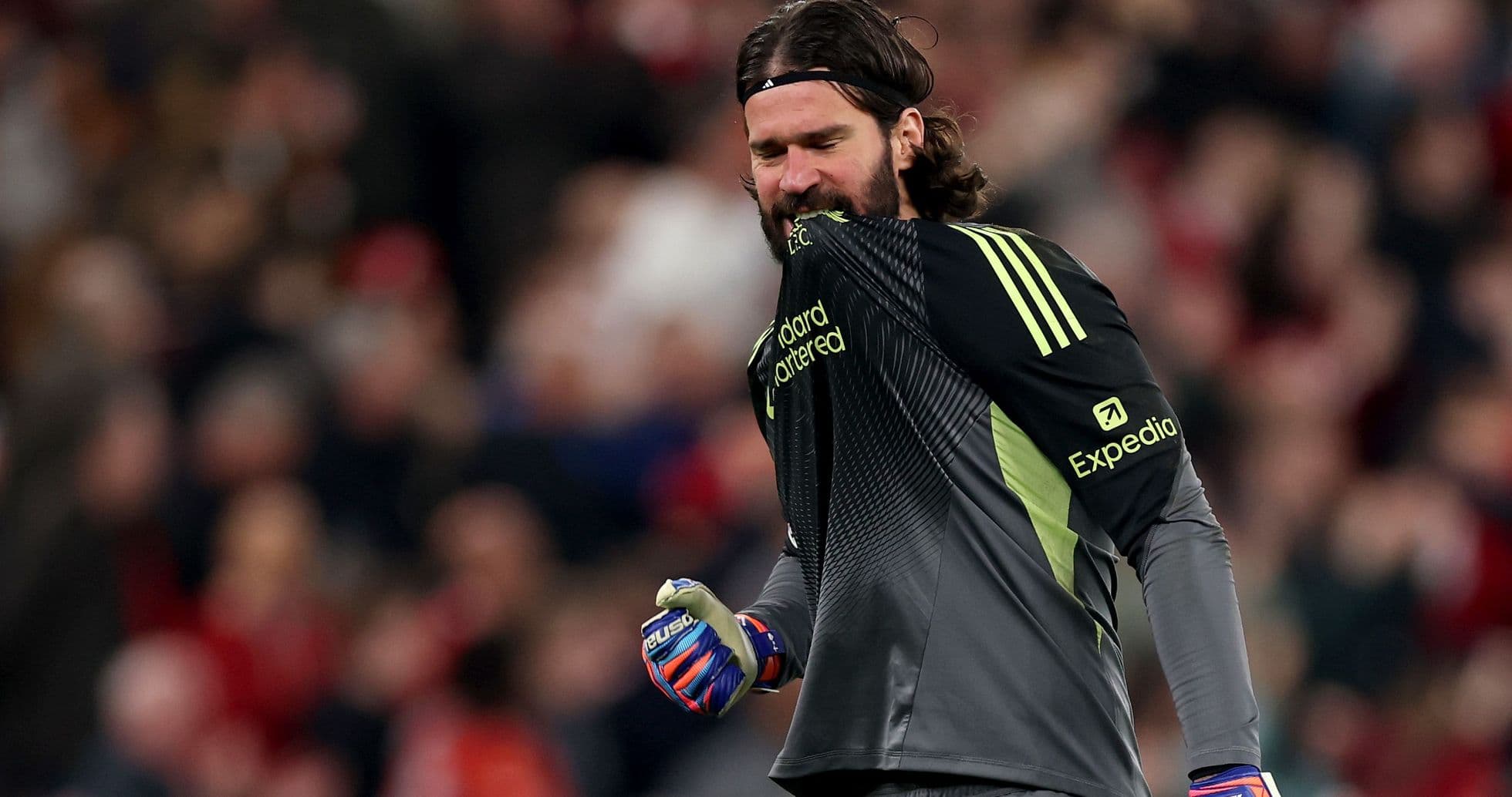 Goalkeeper celebrating with clenched fist during match