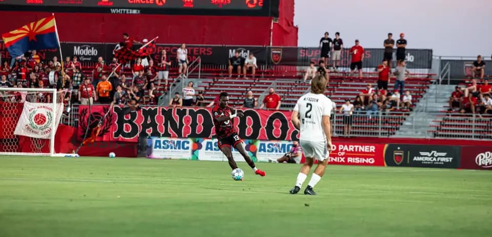 Player passing the ball during Phoenix Rising match