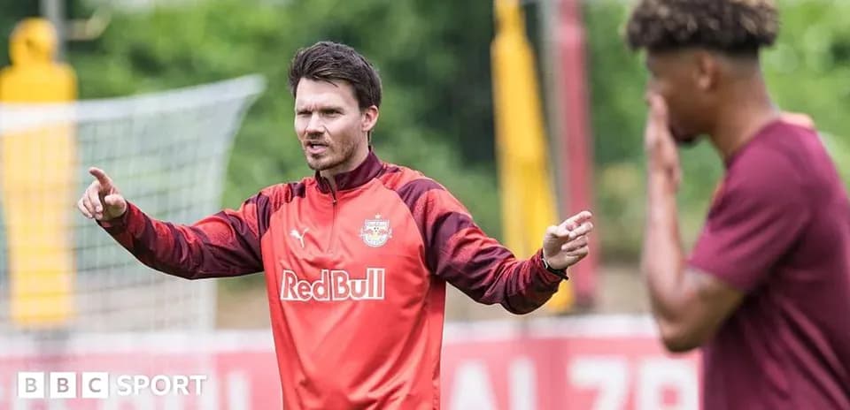 Coach giving instructions during training session
