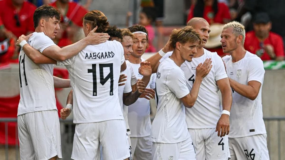 Players celebrating a goal during a match