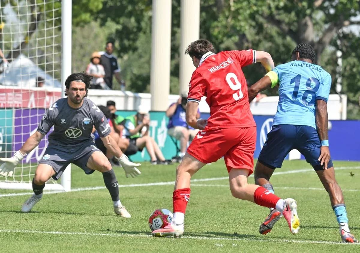 Player shooting on goal during match action