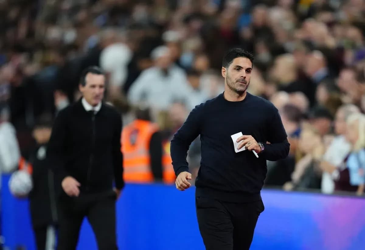 Coaches walking on the sideline during match