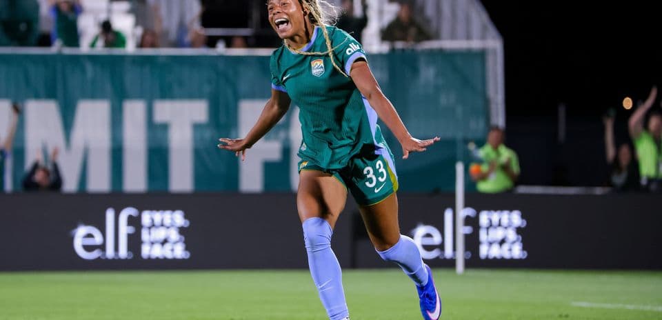 Player celebrating after scoring a goal in match