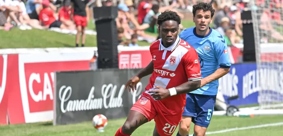 Players in action during HFX Wanderers vs Cavalry match