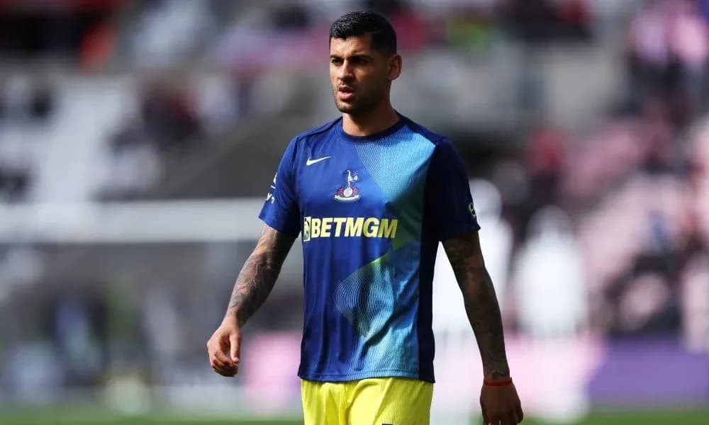 Player in training kit walking on the pitch