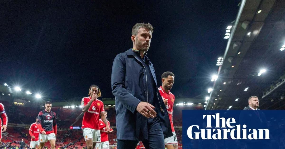 Manchester United players walking off the pitch