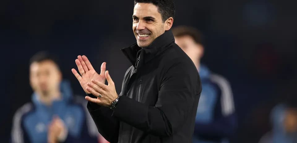 Coach clapping during a team event