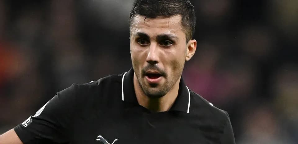 Player in black jersey during match action