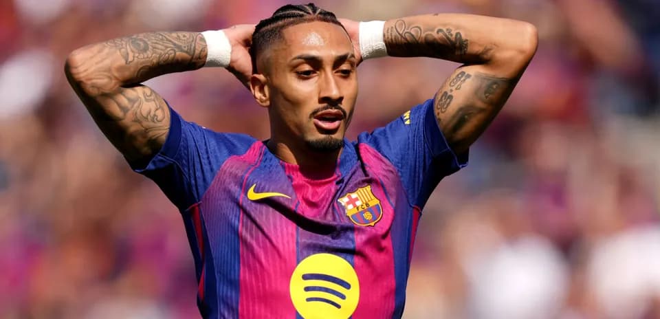 Player reacting during a match wearing Barcelona jersey