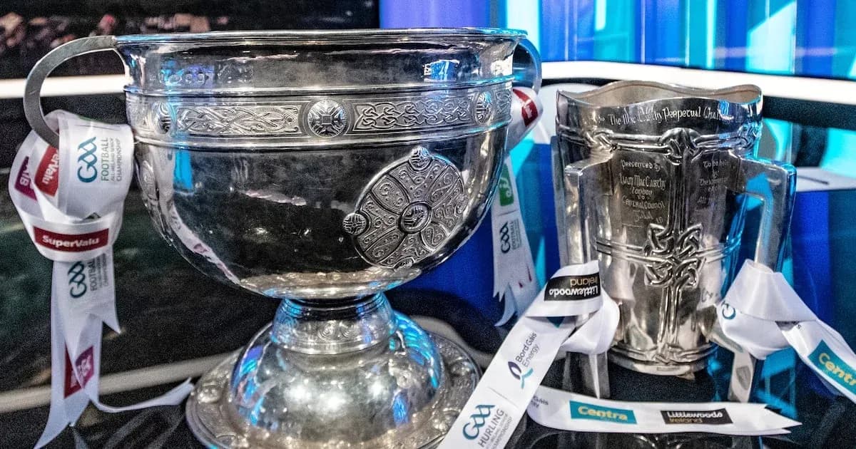 GAA trophies on display with ribbons
