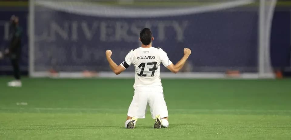 Player Bolanos celebrating on the field