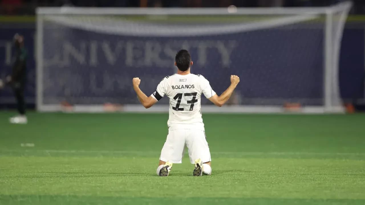 Player Bolanos celebrating on the field